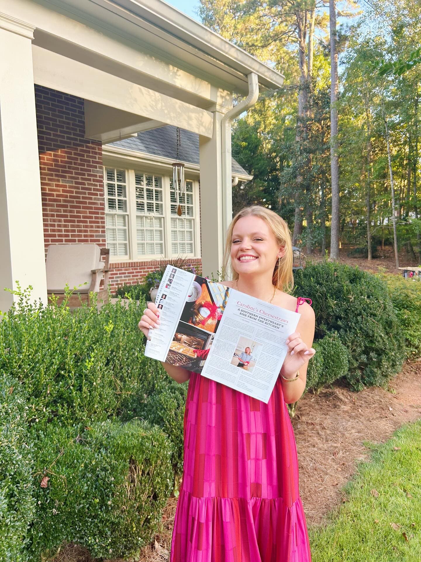 Caroline holding up her magazine feature